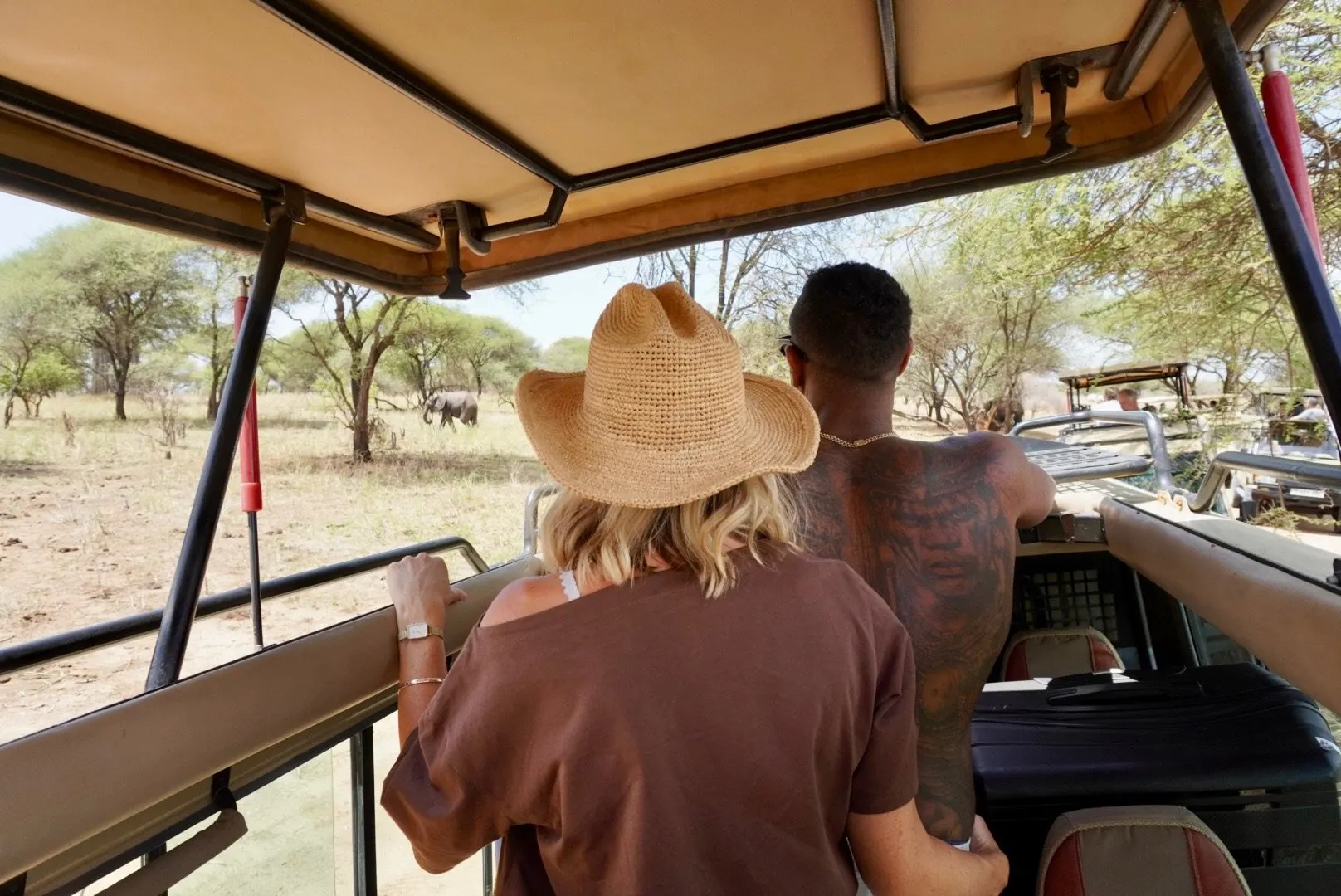 First-time safari guests on a game drive in Tanzania